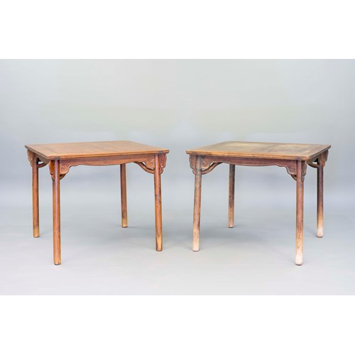 A pair of huanghuali square tables with triple aprons and stretchers